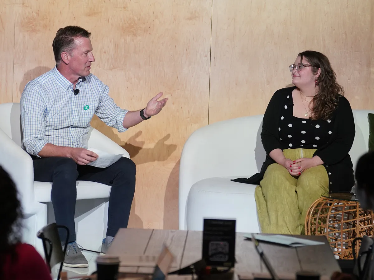 Become a Thought Leader two people talking on stage