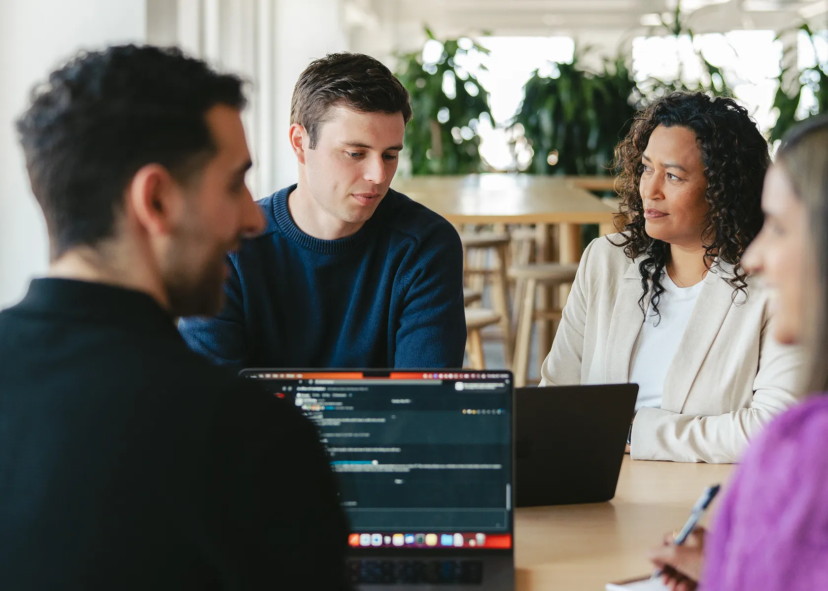 3 people working together