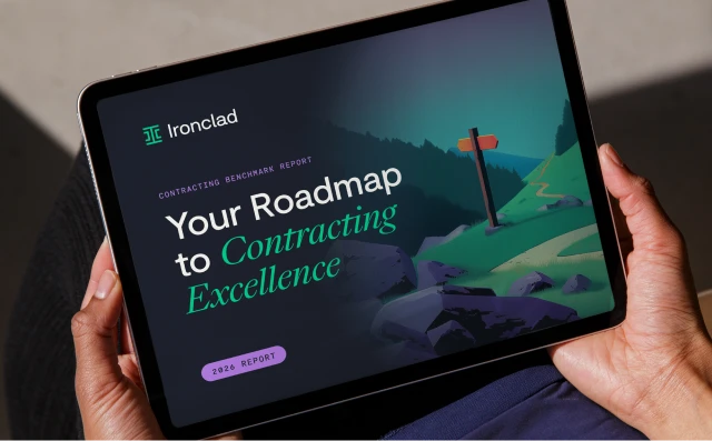 A person holds a tablet displaying a report titled Your Roadmap to Contracting Excellence by Ironclad, with an illustration of a path and signpost in a mountainous landscape.
