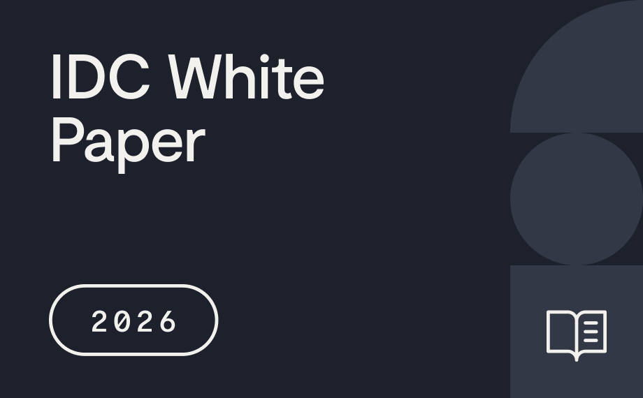 A dark background features the text “IDC White Paper,” “2026 IDC Report” in an outlined oval, abstract shapes, and a small open book icon in the lower right corner.