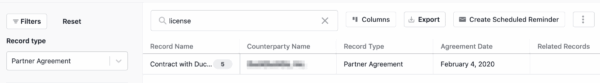 A software interface displays a filtered list of records. The visible row shows a partner agreement with a blurred country/company name, an agreement date of February 4, 2020, digital signatures, and options to export or create reminders.