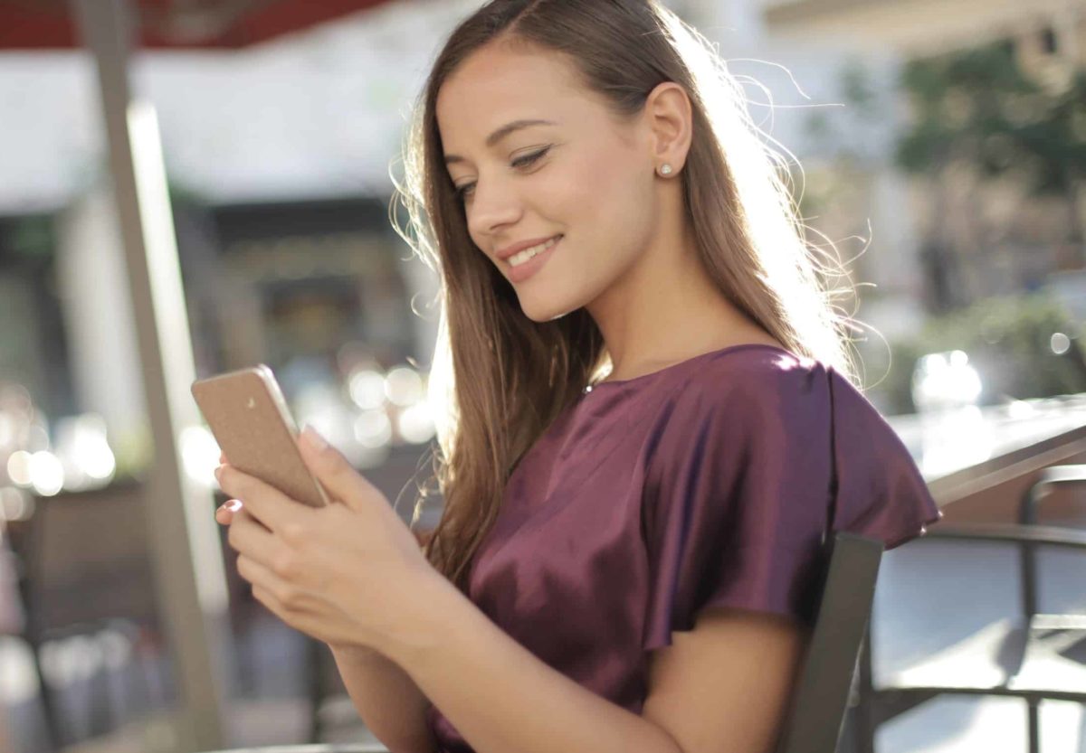 woman reviewing digital employment contract on smartphone