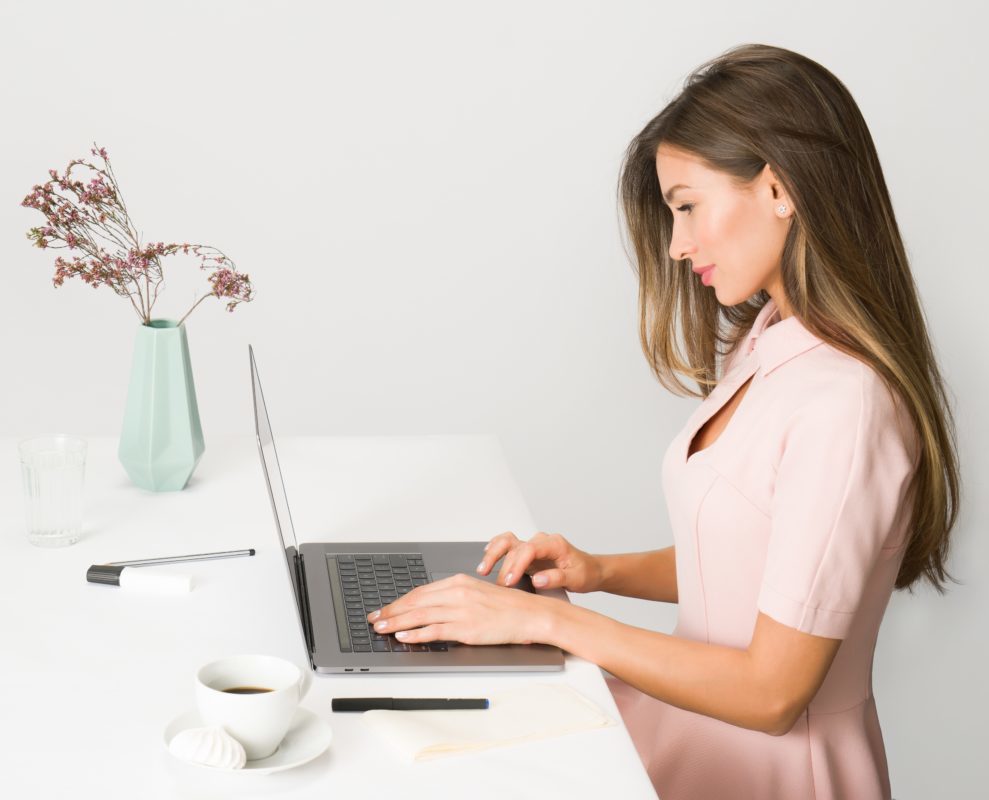 woman at computer working on an Implied contract of employment