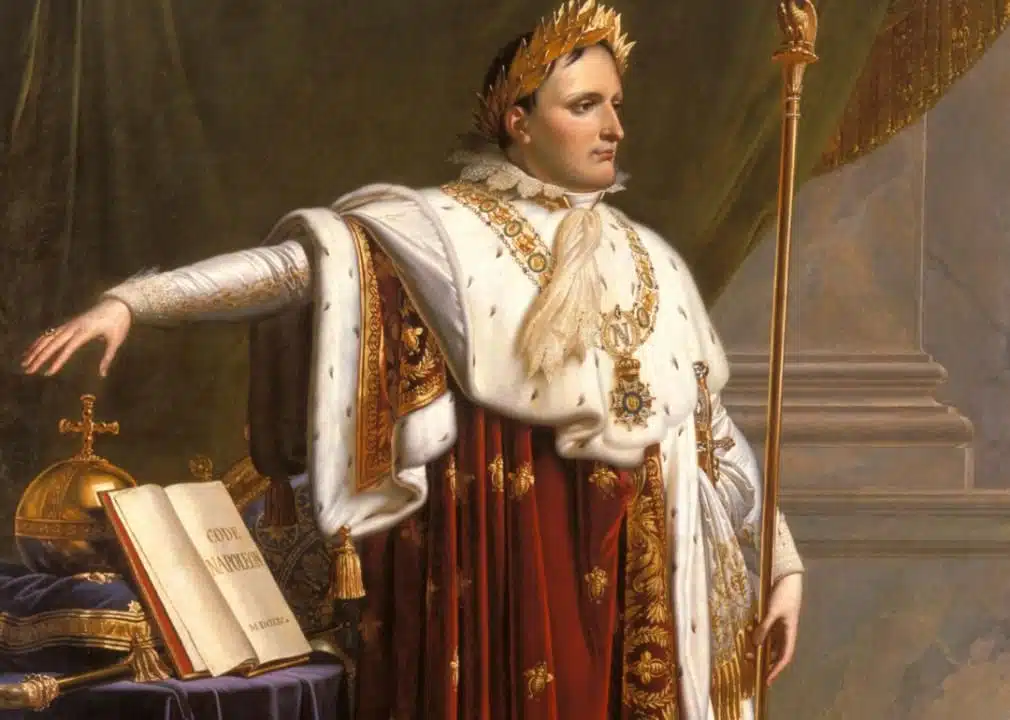 Napoleon standing next to the Napoleonic Code