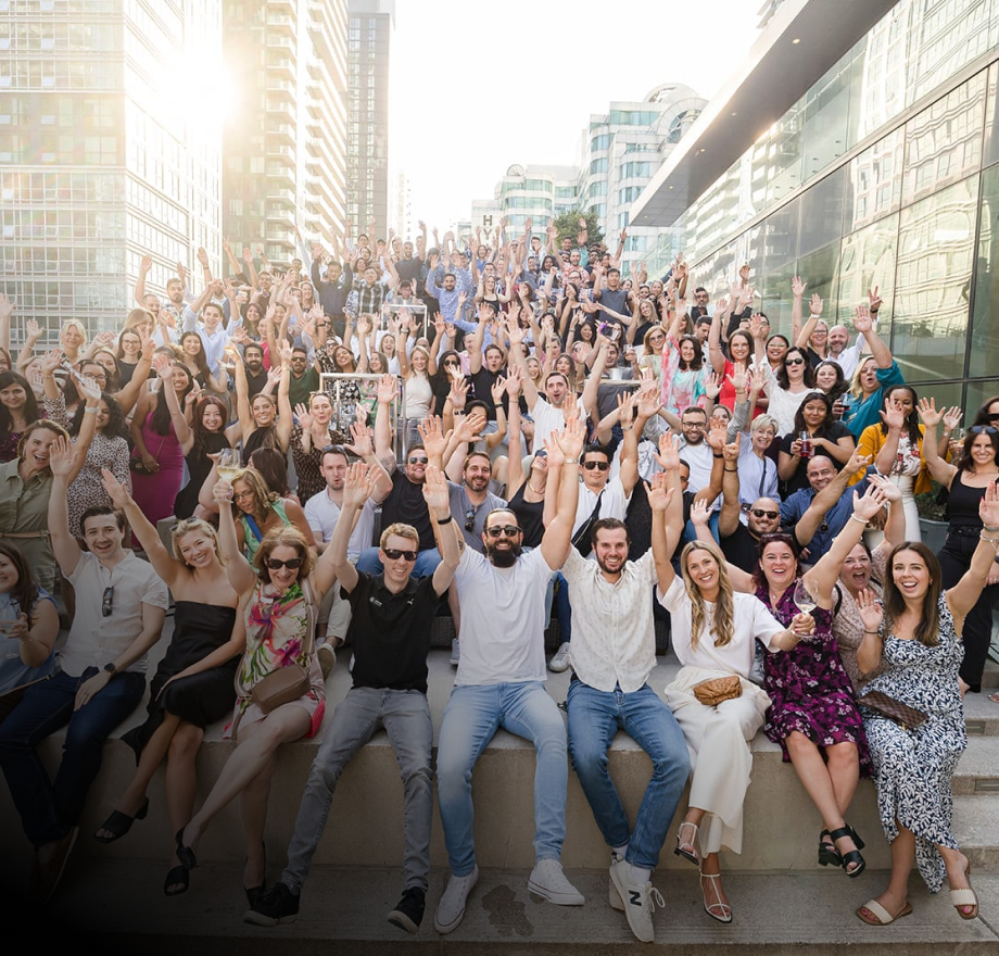 group of dental corp employees cheering