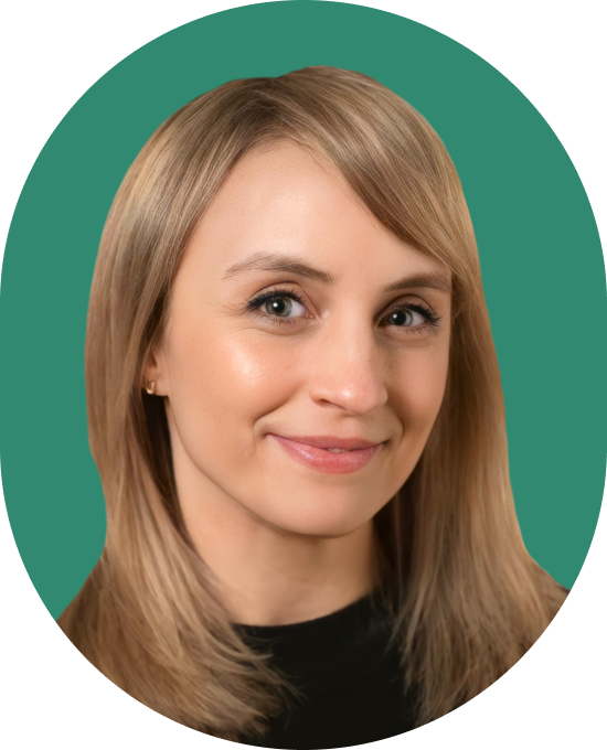 Portrait of a woman with straight, light brown hair and blue eyes, smiling softly. She is wearing a black top and is pictured against a solid teal background.