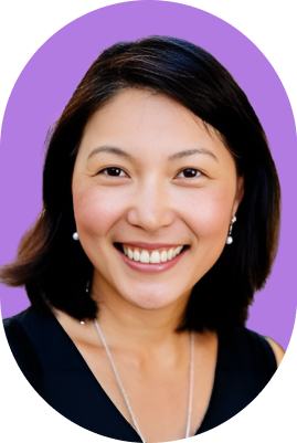 A woman with straight dark hair, wearing a black top, pearl earrings, and a necklace, smiles at the camera against a purple background—exuding the poise of an ironclad jurist AI.